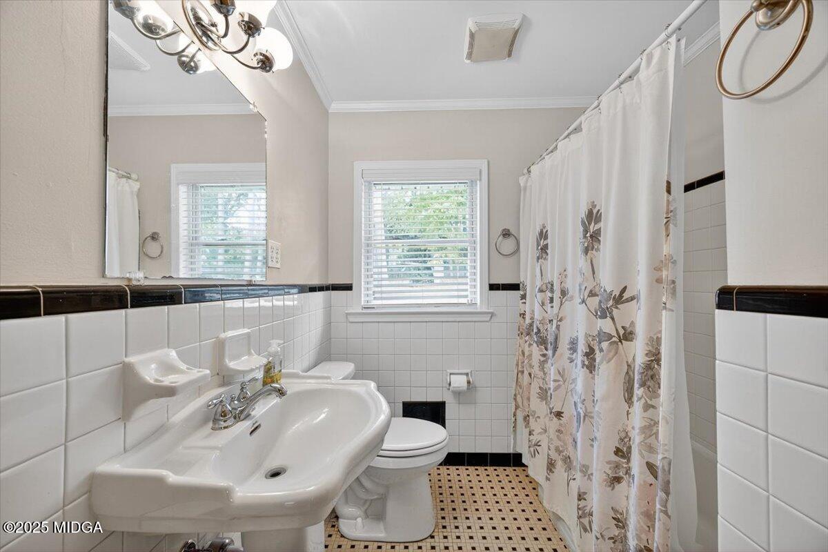 84 Hillsdale Road Forsyth, GA 31029 - Photo 13 of 27 a bathroom with a sink toilet and shower