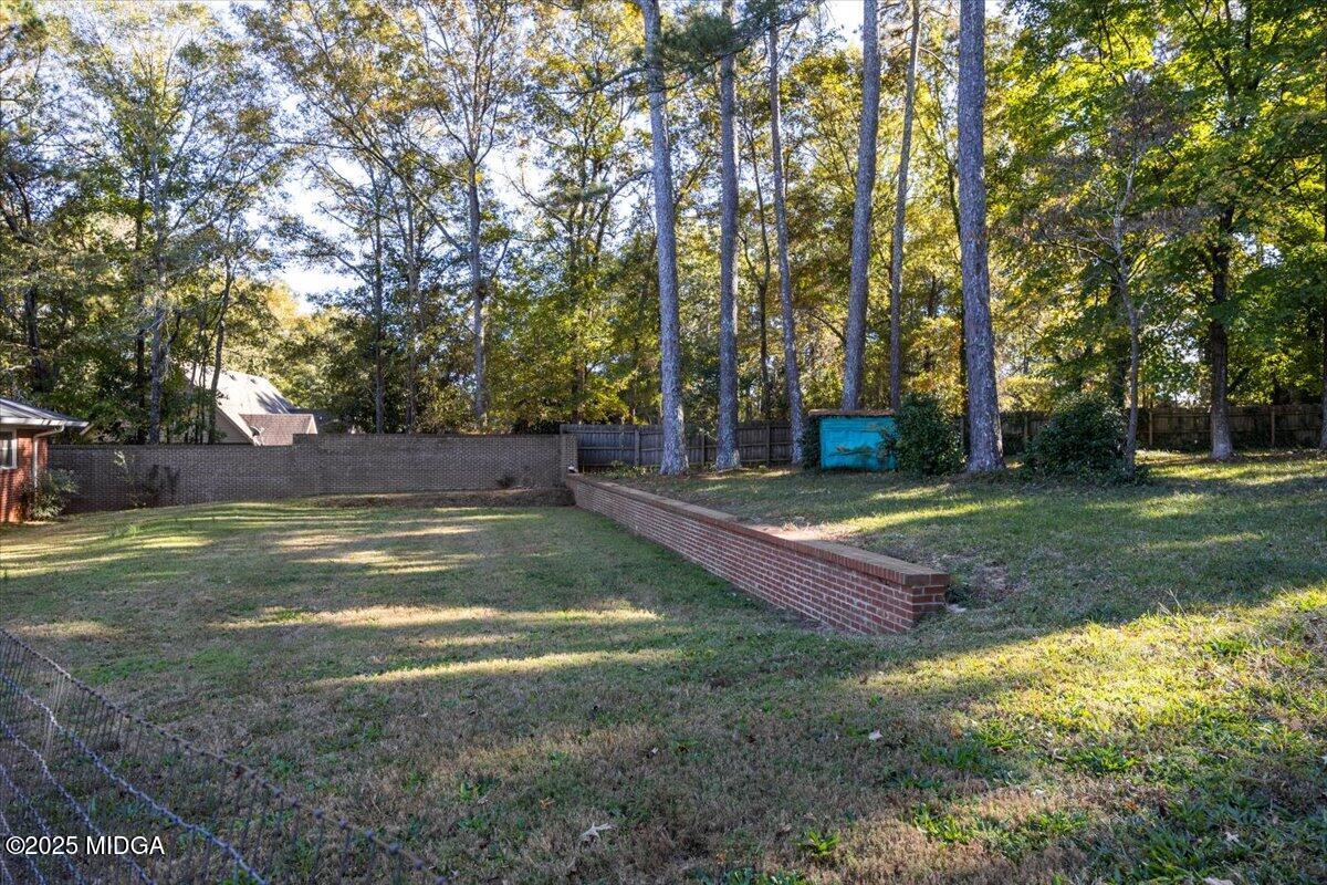 84 Hillsdale Road Forsyth, GA 31029 - Photo 24 of 27 a view of a house with a yard