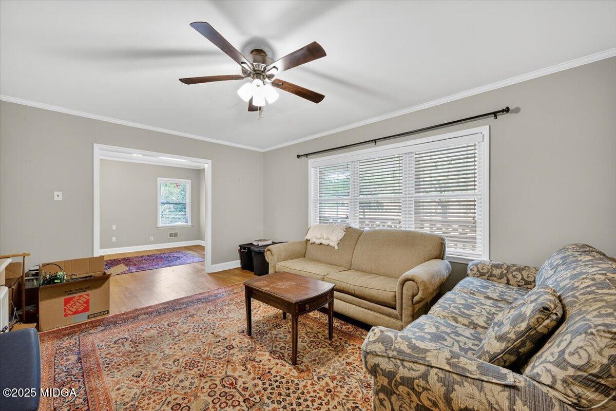 84 Hillsdale Road Forsyth, GA 31029 - Photo 6 of 27 a living room with furniture and a large window