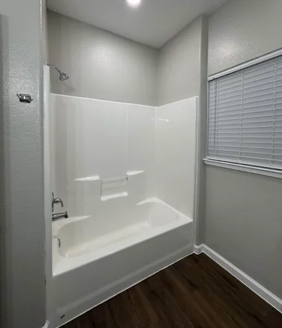 a bathroom with a bathtub