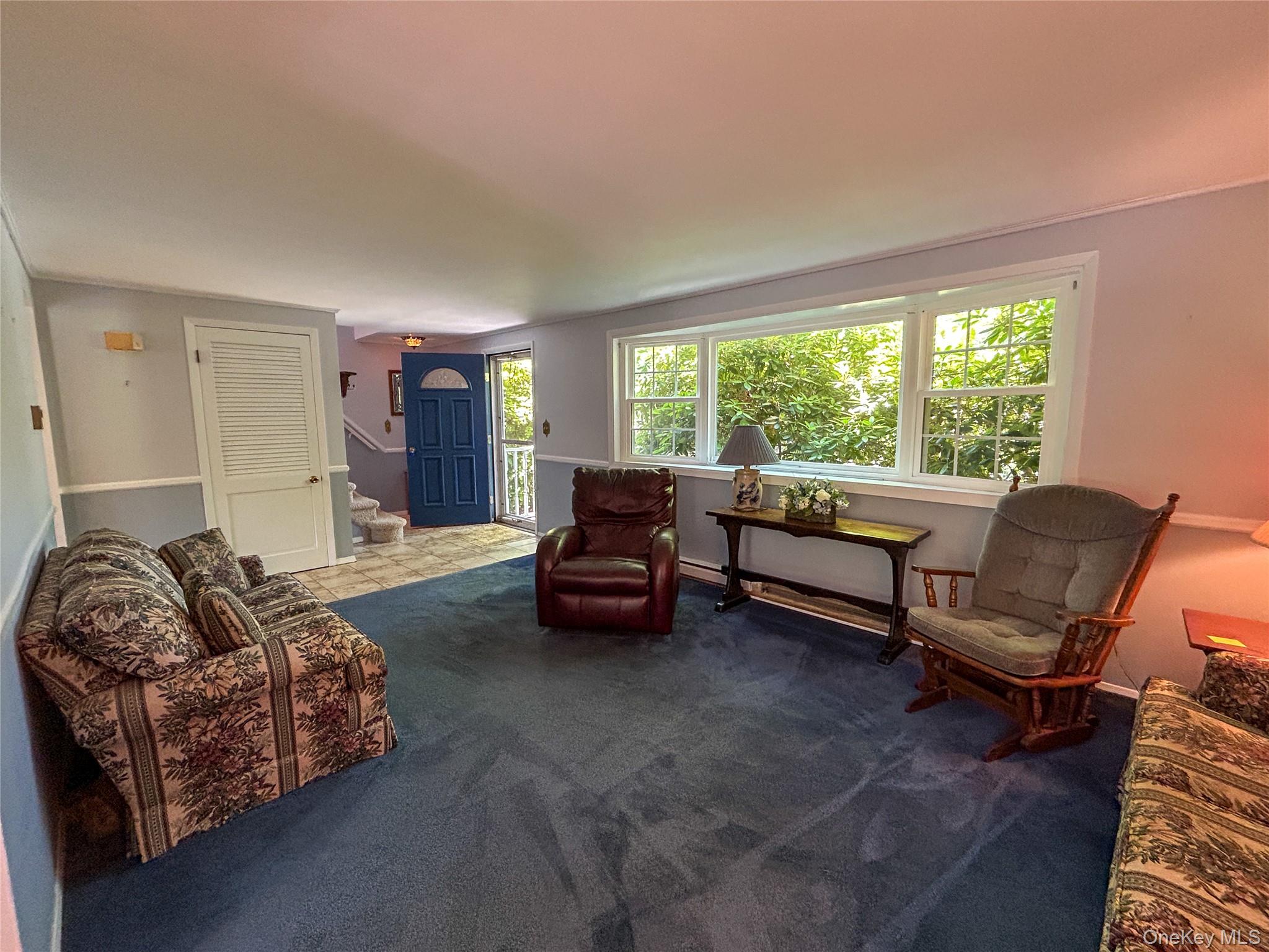 3 Johnston Road Livingston Manor, NY 12758 - Photo 20 of 43 a living room with furniture and a large window