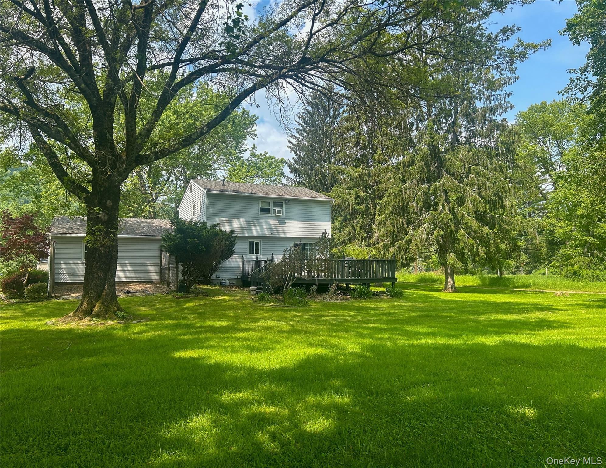 3 Johnston Road Livingston Manor, NY 12758 - Photo 2 of 43 a front view of a house with a garden