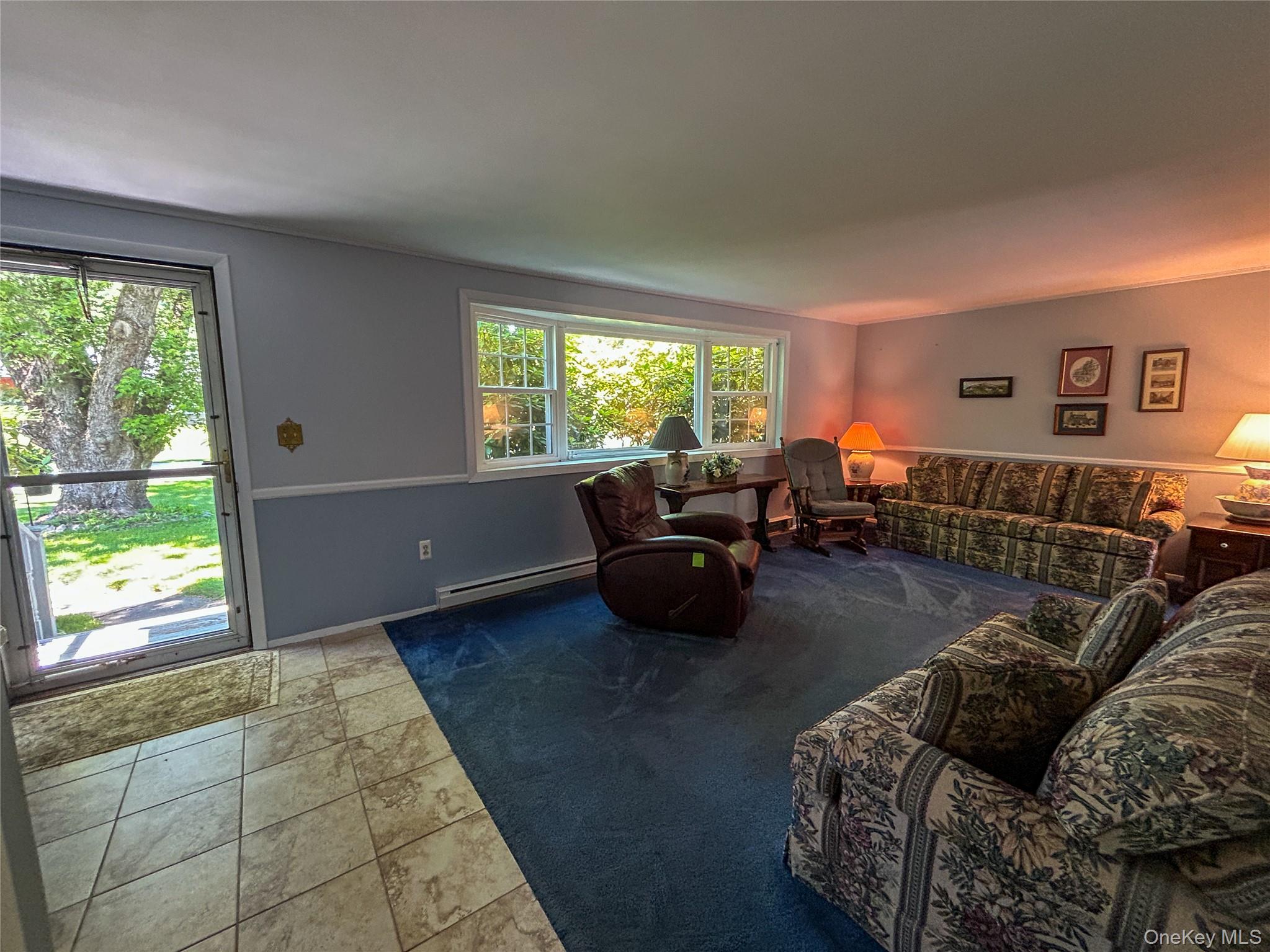 3 Johnston Road Livingston Manor, NY 12758 - Photo 22 of 43 a living room with furniture and a large window