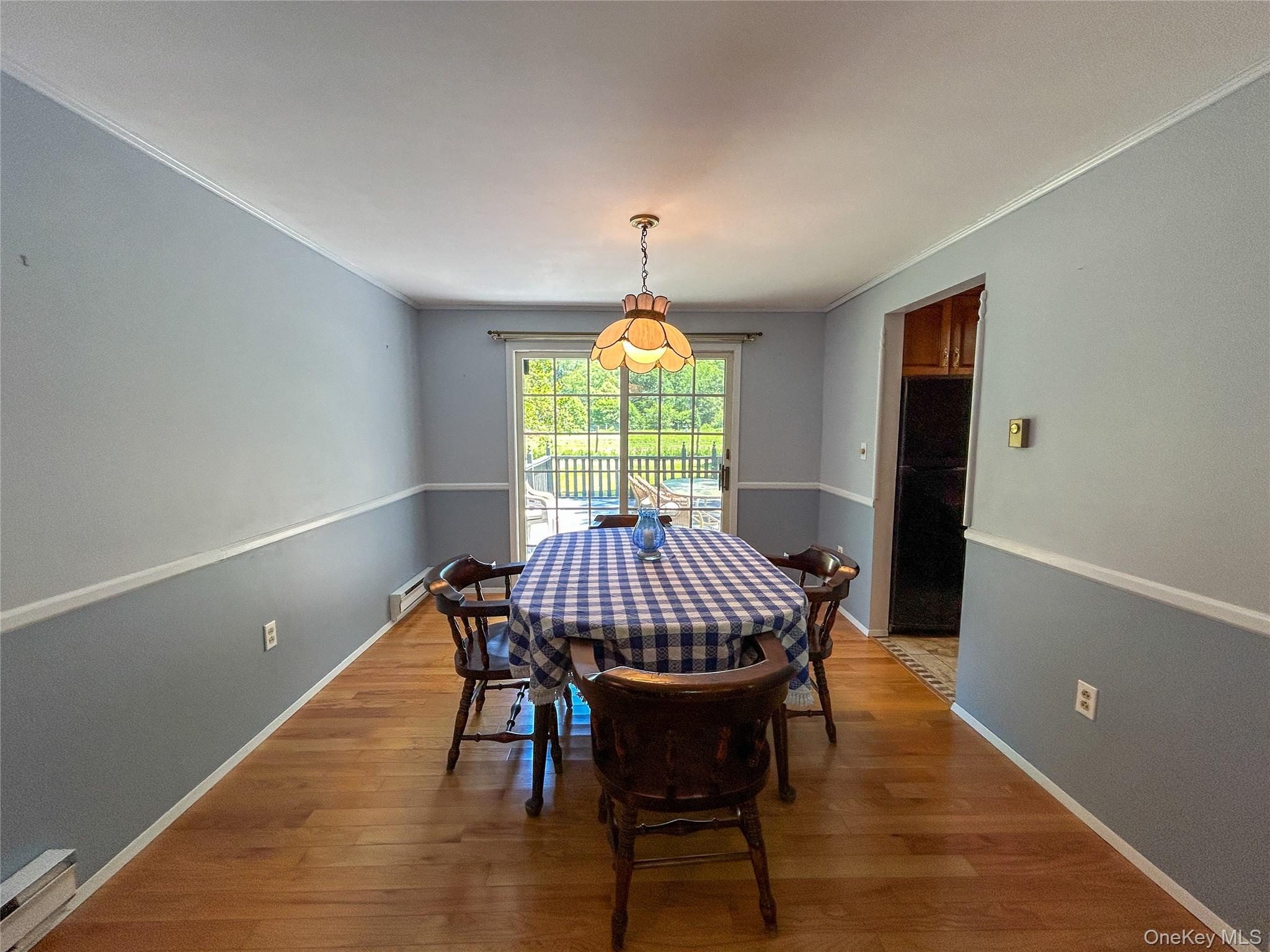 3 Johnston Road Livingston Manor, NY 12758 - Photo 23 of 43 a view of a dining room with furniture window and wooden floor