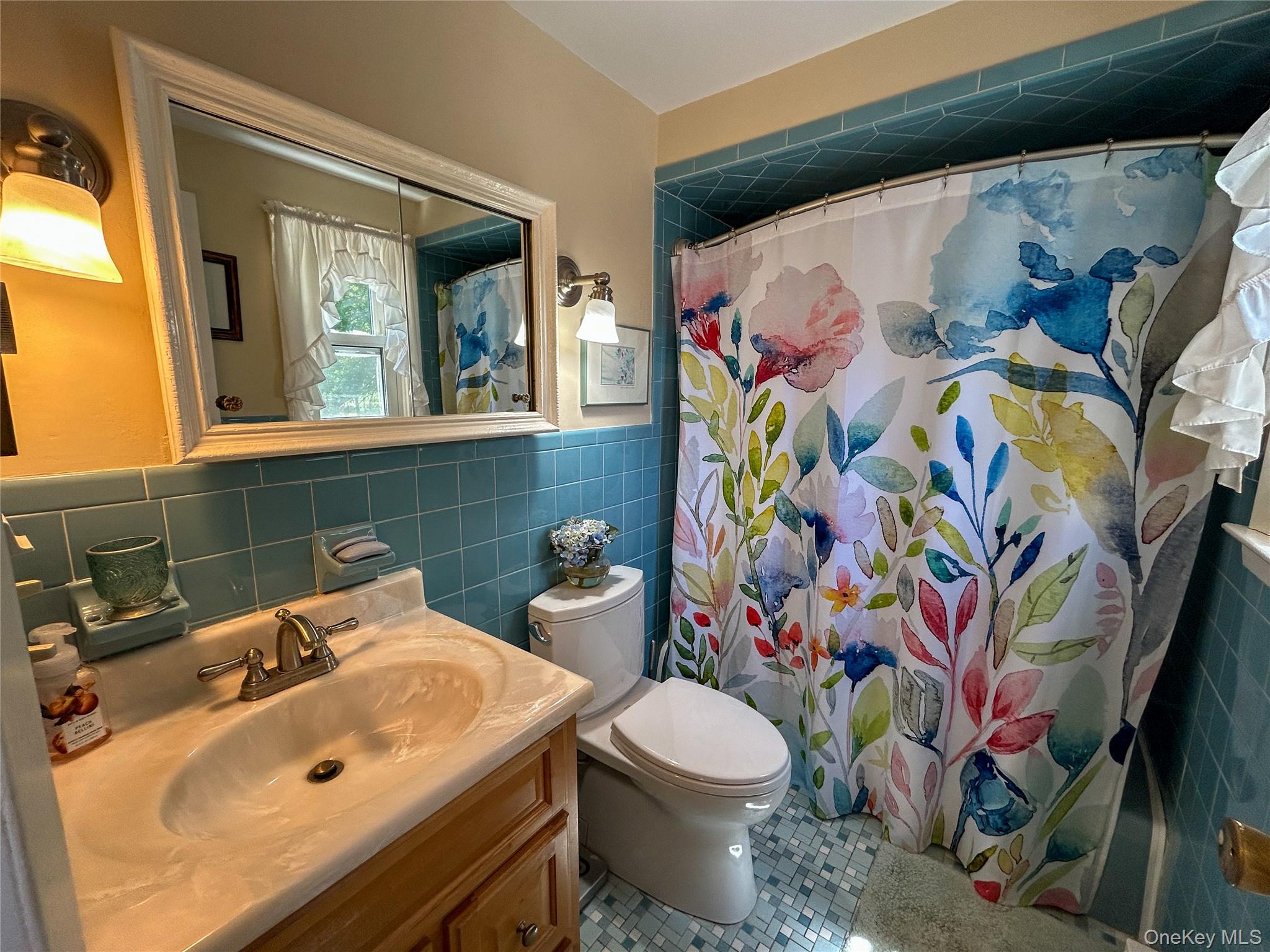 3 Johnston Road Livingston Manor, NY 12758 - Photo 26 of 43 a bathroom with a sink mirror and toilet