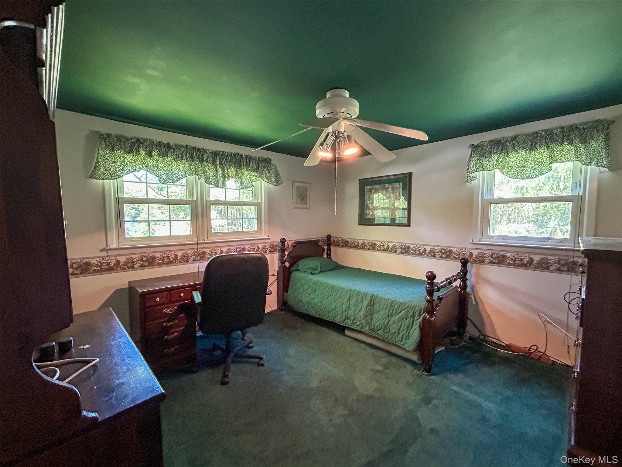 3 Johnston Road Livingston Manor, NY 12758 - Photo 32 of 43 a bedroom with a bed and large windows