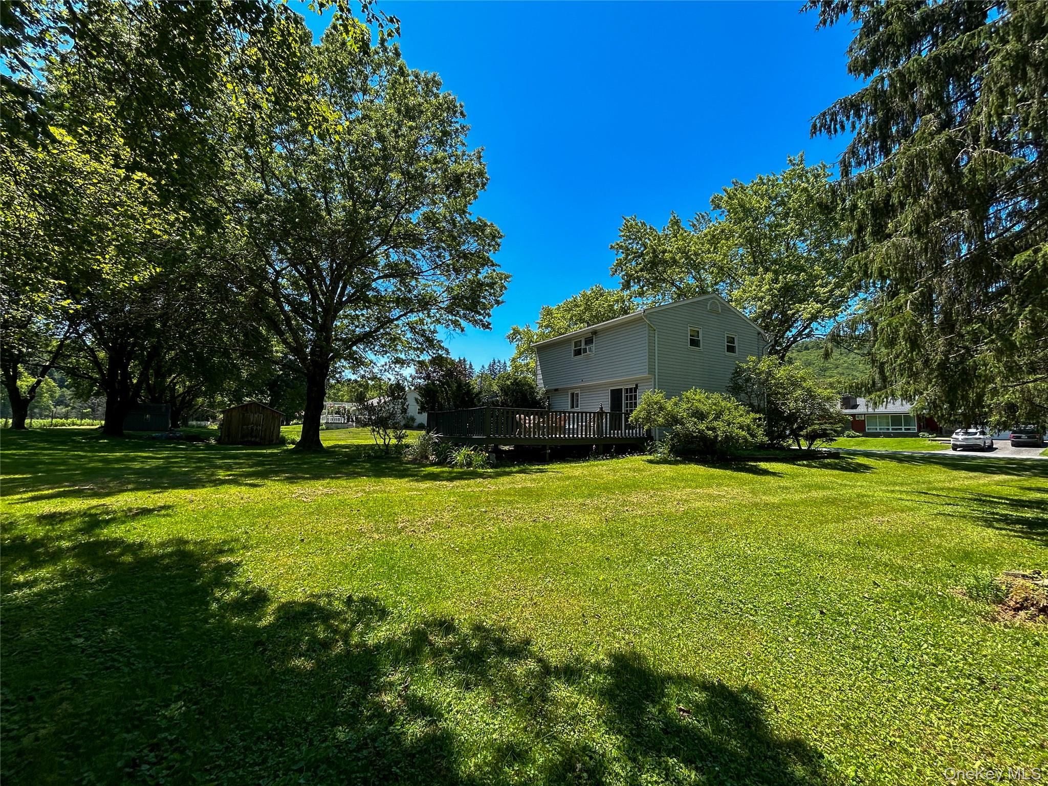 3 Johnston Road Livingston Manor, NY 12758 - Photo 36 of 43 a house view with swimming pool in front of it