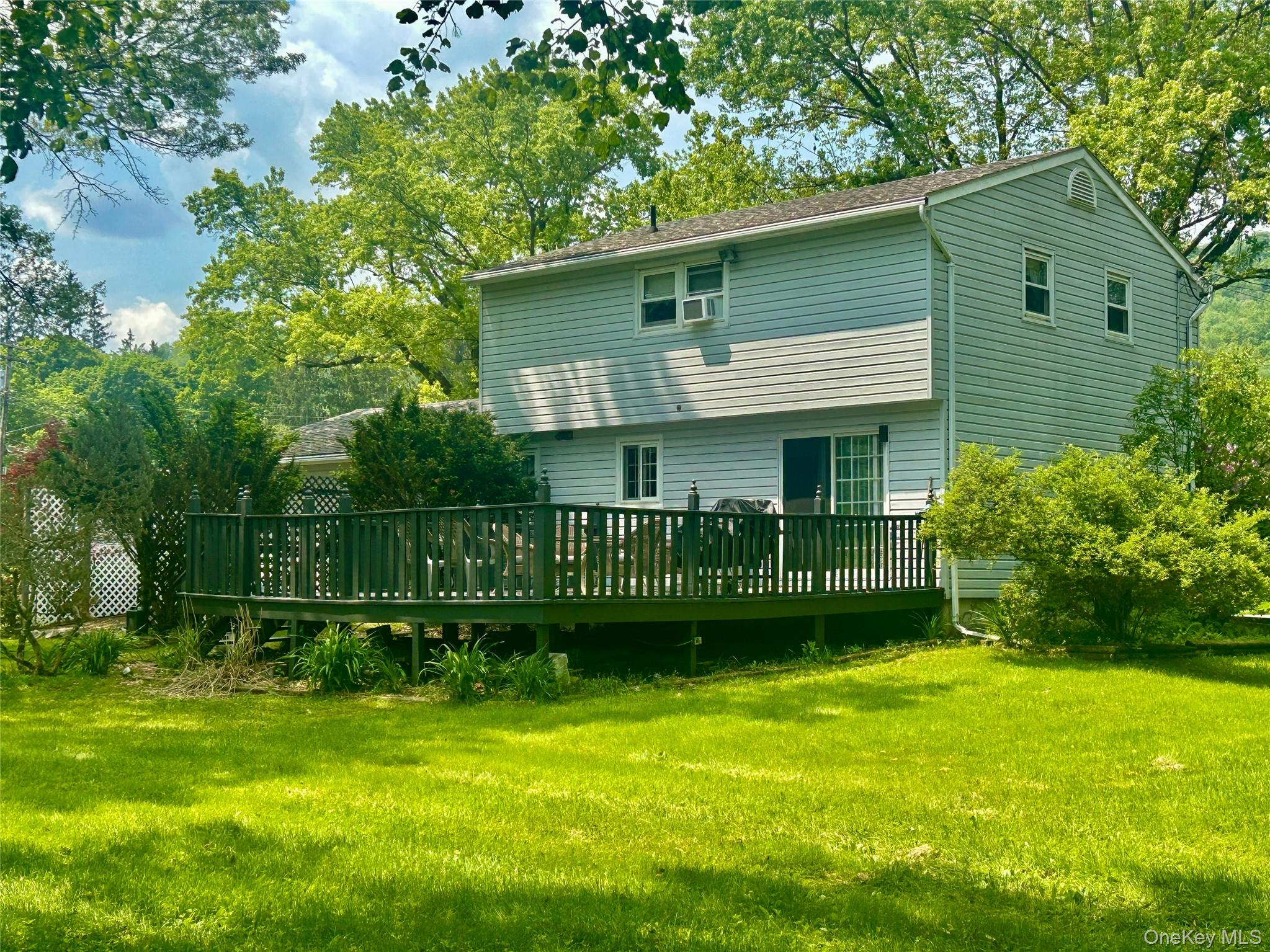 3 Johnston Road Livingston Manor, NY 12758 - Photo 4 of 43 a view of a house with a yard and a garden