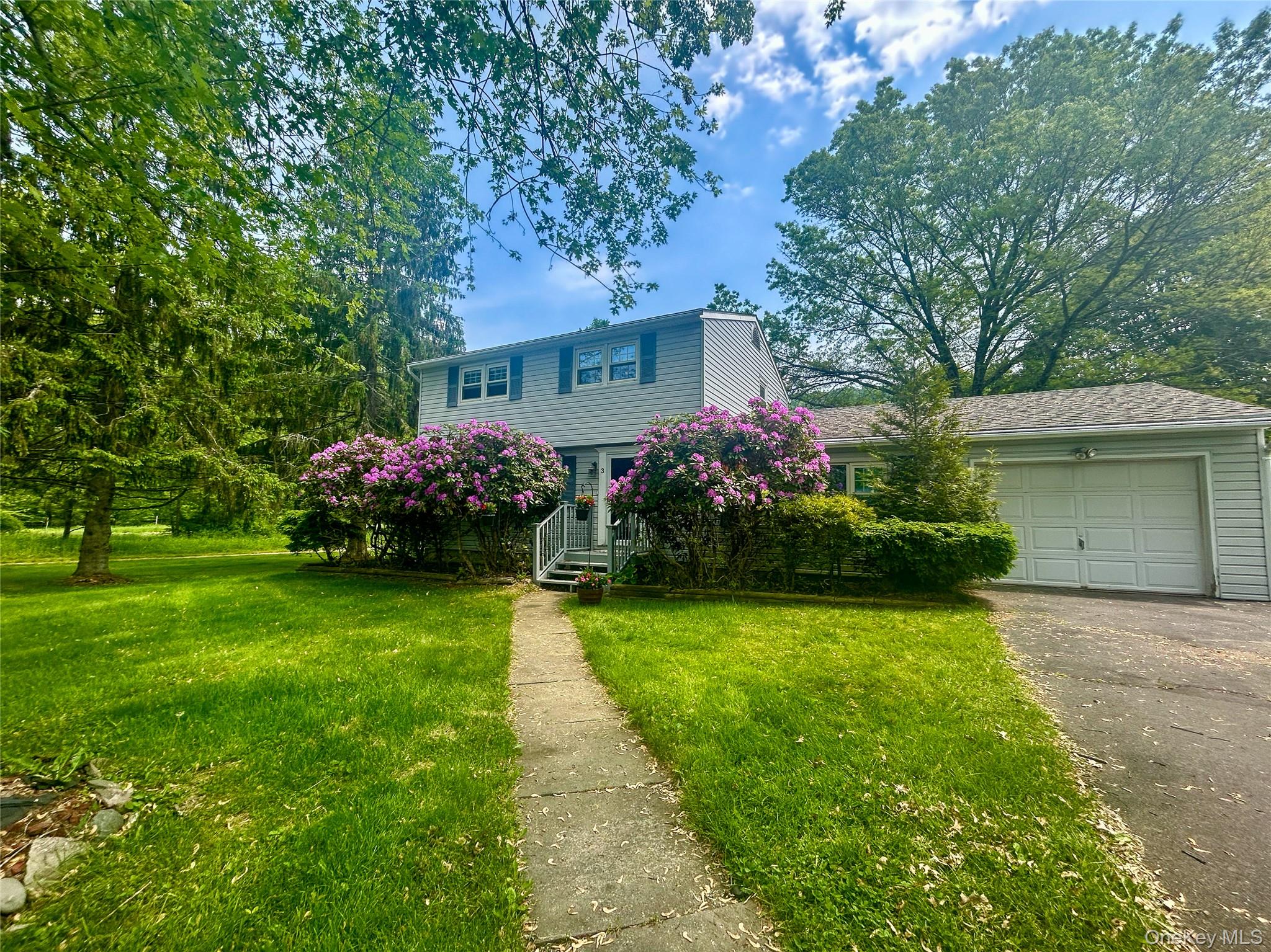3 Johnston Road Livingston Manor, NY 12758 - Photo 8 of 43 a front view of a house with garden