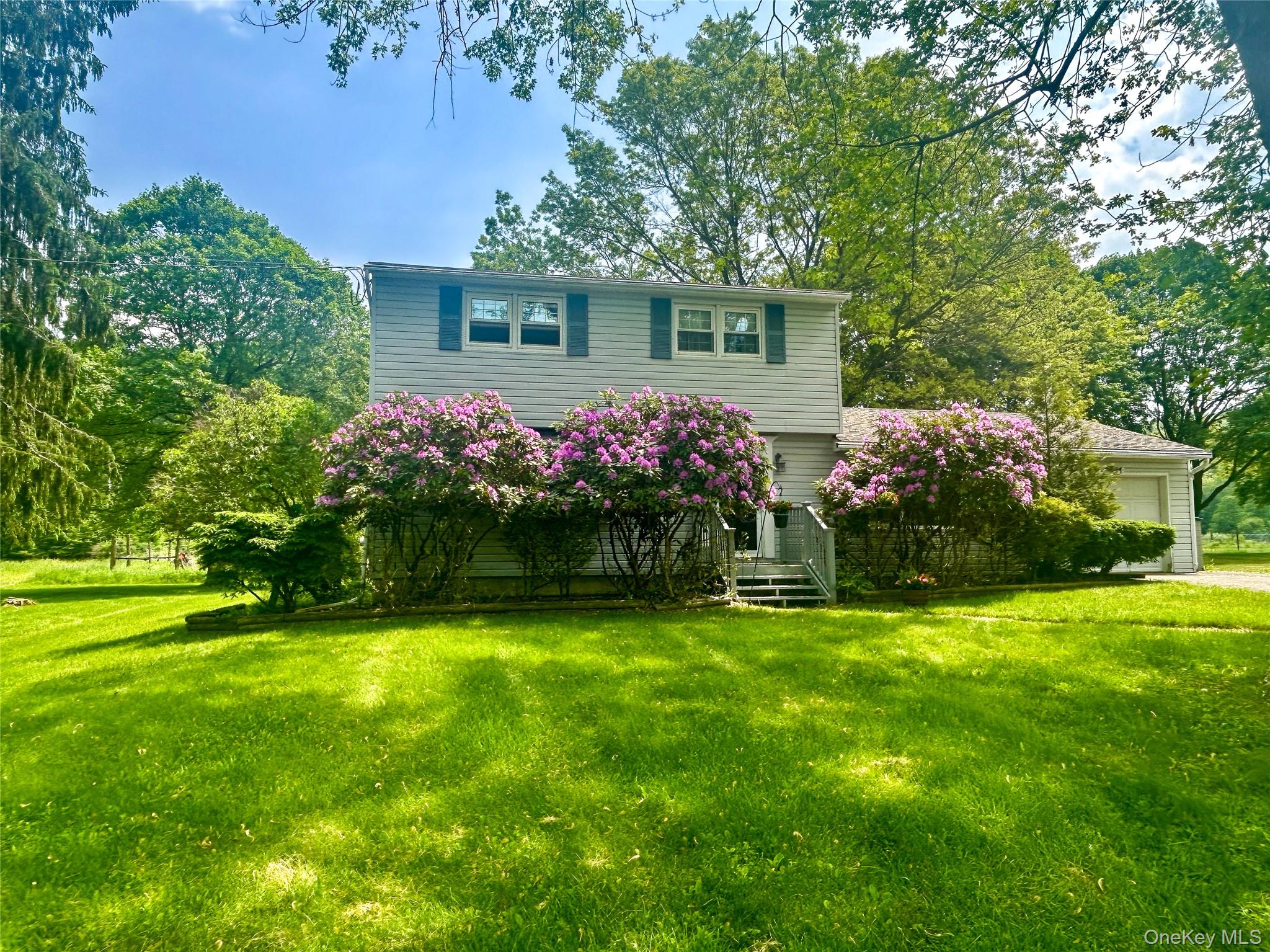 3 Johnston Road Livingston Manor, NY 12758 - Photo 9 of 43 a front view of a house with garden