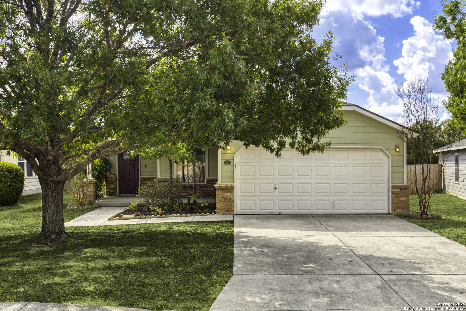 161 Michelle Lane Boerne, TX 78006 - Photo 1 of 1 a view of a garden with large tree