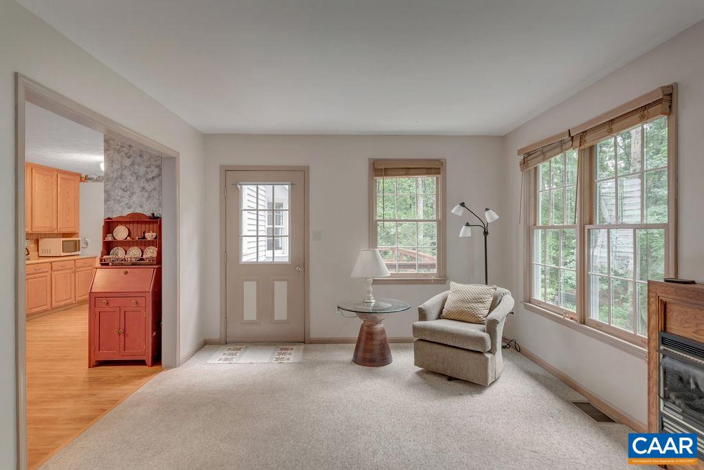 4875 Mechunk Road Keswick, VA 22947 - Photo 12 of 38 a living room with furniture and large windows
