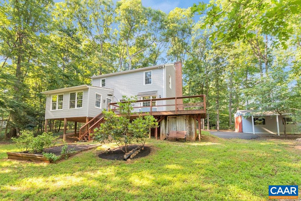 4875 Mechunk Road Keswick, VA 22947 - Photo 2 of 38 a view of a house with a back yard