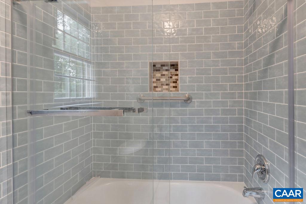 4875 Mechunk Road Keswick, VA 22947 - Photo 21 of 38 a bathroom with a shower