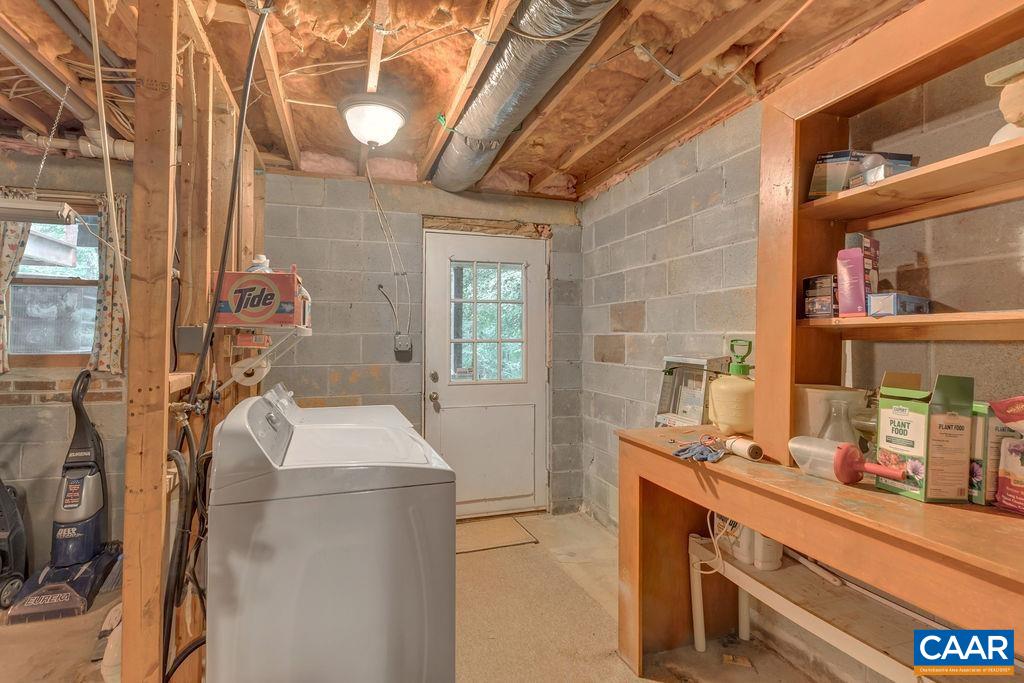 4875 Mechunk Road Keswick, VA 22947 - Photo 24 of 38 a room with sink washer and dryer
