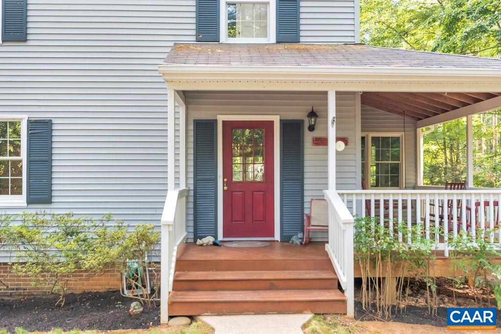 4875 Mechunk Road Keswick, VA 22947 - Photo 25 of 38 a front view of a house with a porch