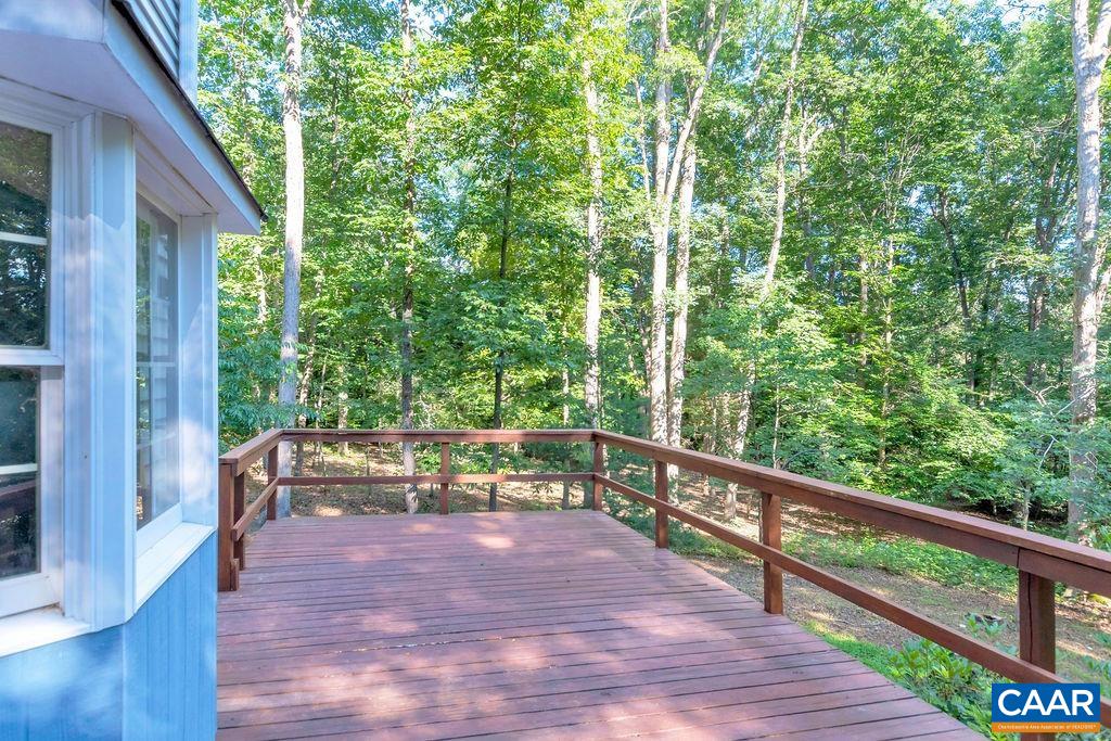 4875 Mechunk Road Keswick, VA 22947 - Photo 29 of 38 a view of outdoor space with deck and yard
