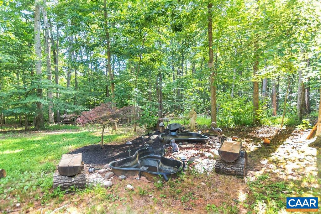 4875 Mechunk Road Keswick, VA 22947 - Photo 33 of 38 a garden view with a seating space
