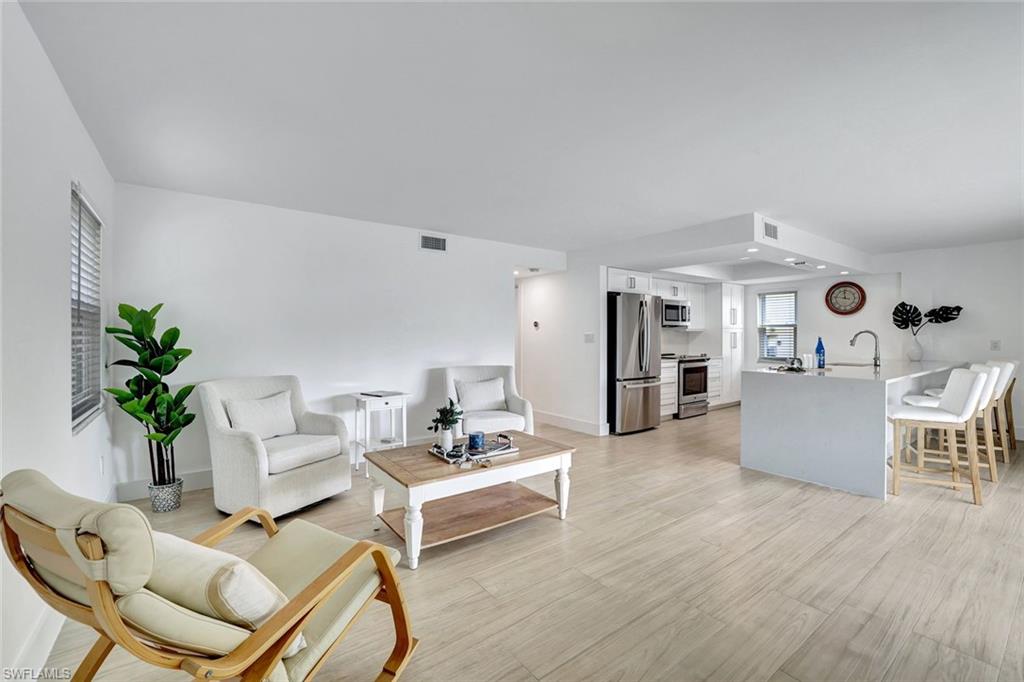 1155 Sandpiper Street, Unit A7 Naples, FL 34102 - Photo 3 of 23