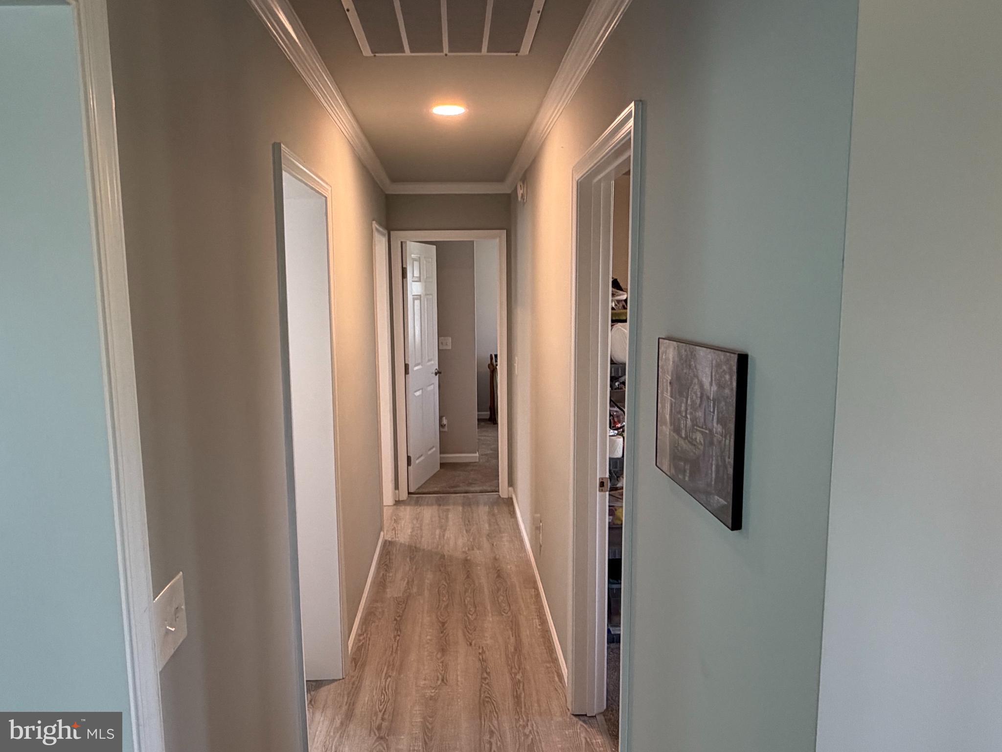 36032 Double Bridges Road Frankford, DE 19945 - Photo 27 of 51 a view of a hallway with wooden floor and entryway