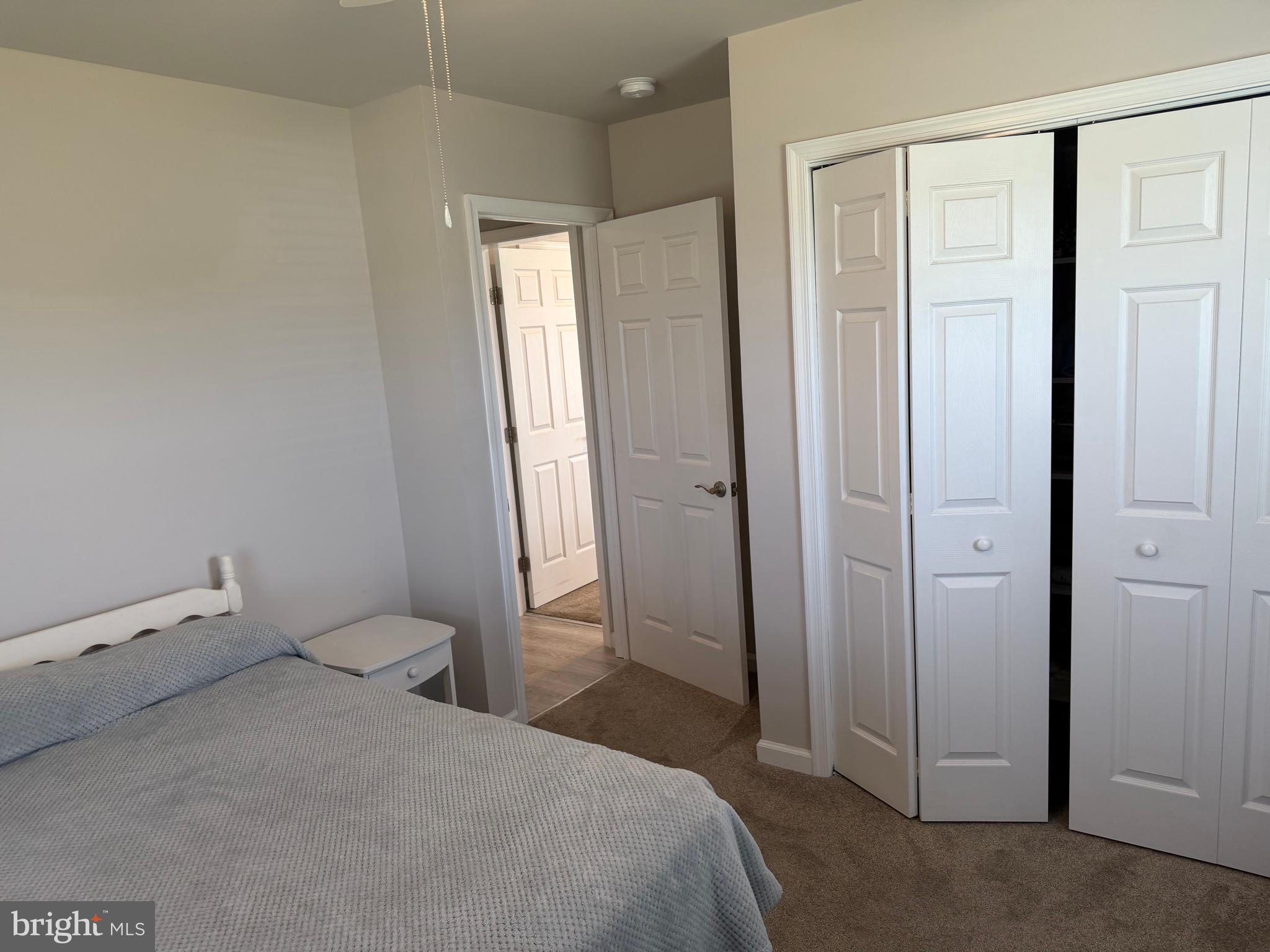 36032 Double Bridges Road Frankford, DE 19945 - Photo 28 of 51 a bedroom with a bed and a window
