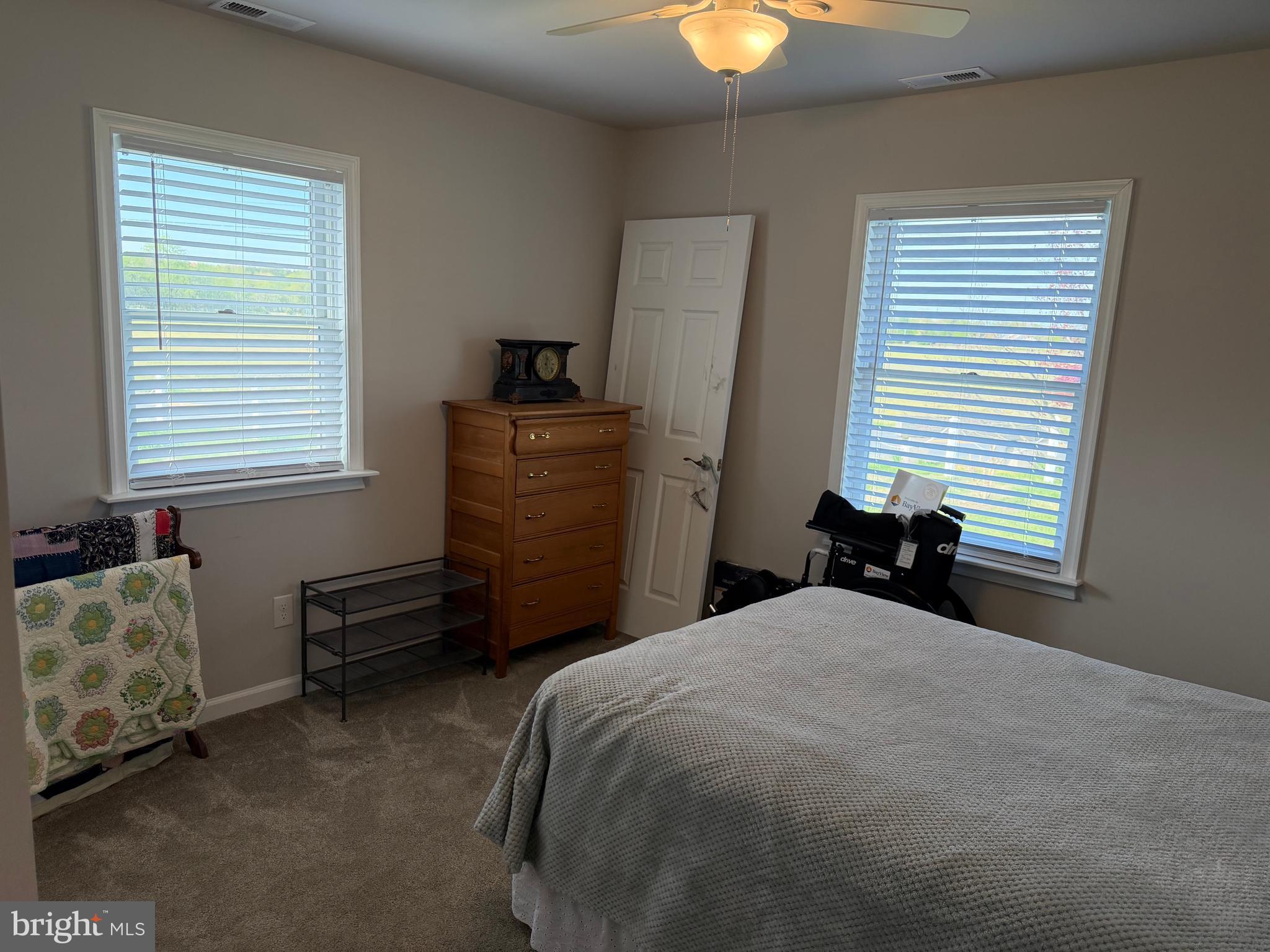 36032 Double Bridges Road Frankford, DE 19945 - Photo 29 of 51 a bedroom with a bed and a window