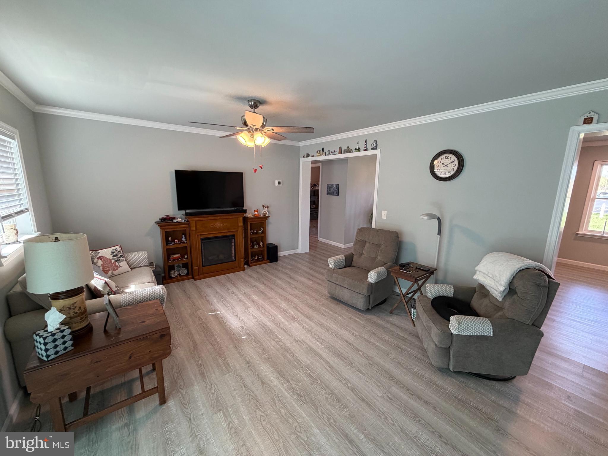 36032 Double Bridges Road Frankford, DE 19945 - Photo 38 of 51 a living room with furniture and a flat screen tv