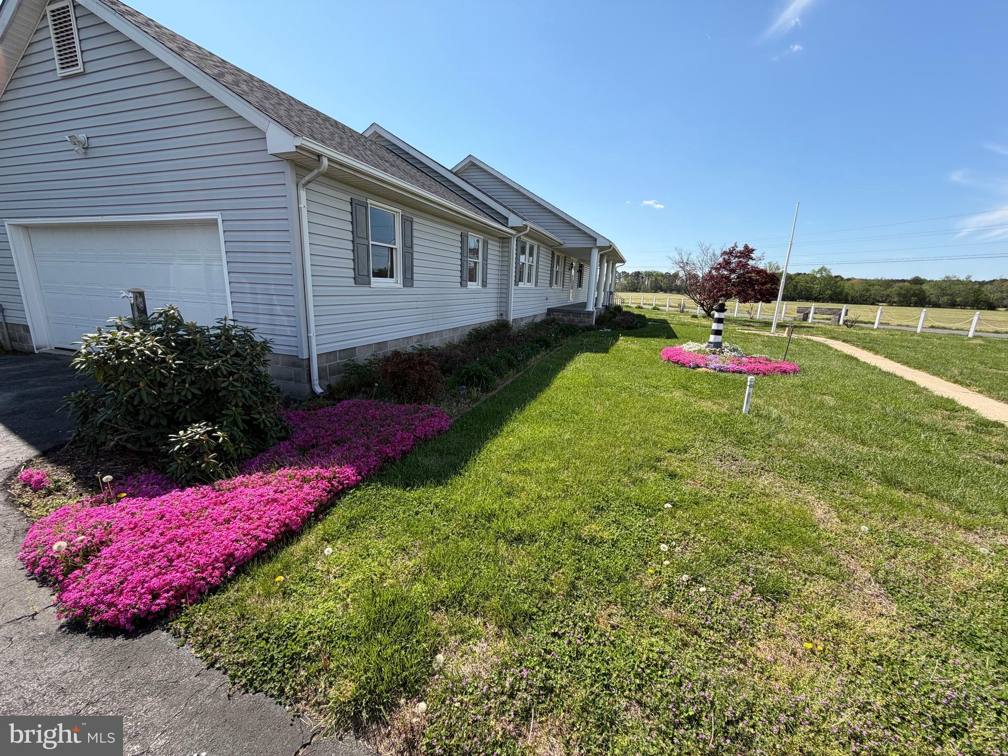 36032 Double Bridges Road Frankford, DE 19945 - Photo 4 of 51 a front view of house with yard and outdoor seating
