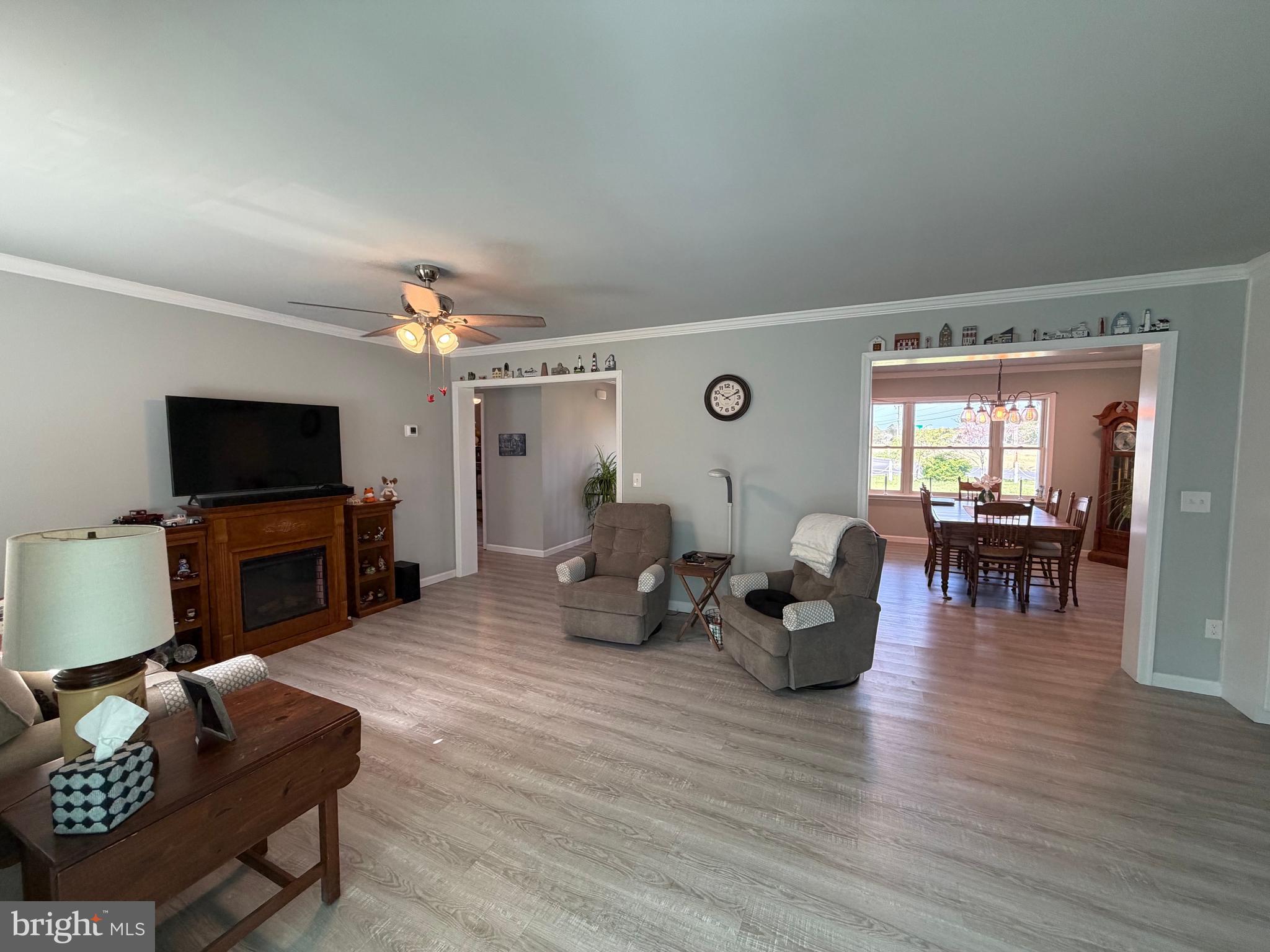 36032 Double Bridges Road Frankford, DE 19945 - Photo 41 of 51 a living room with furniture and a flat screen tv