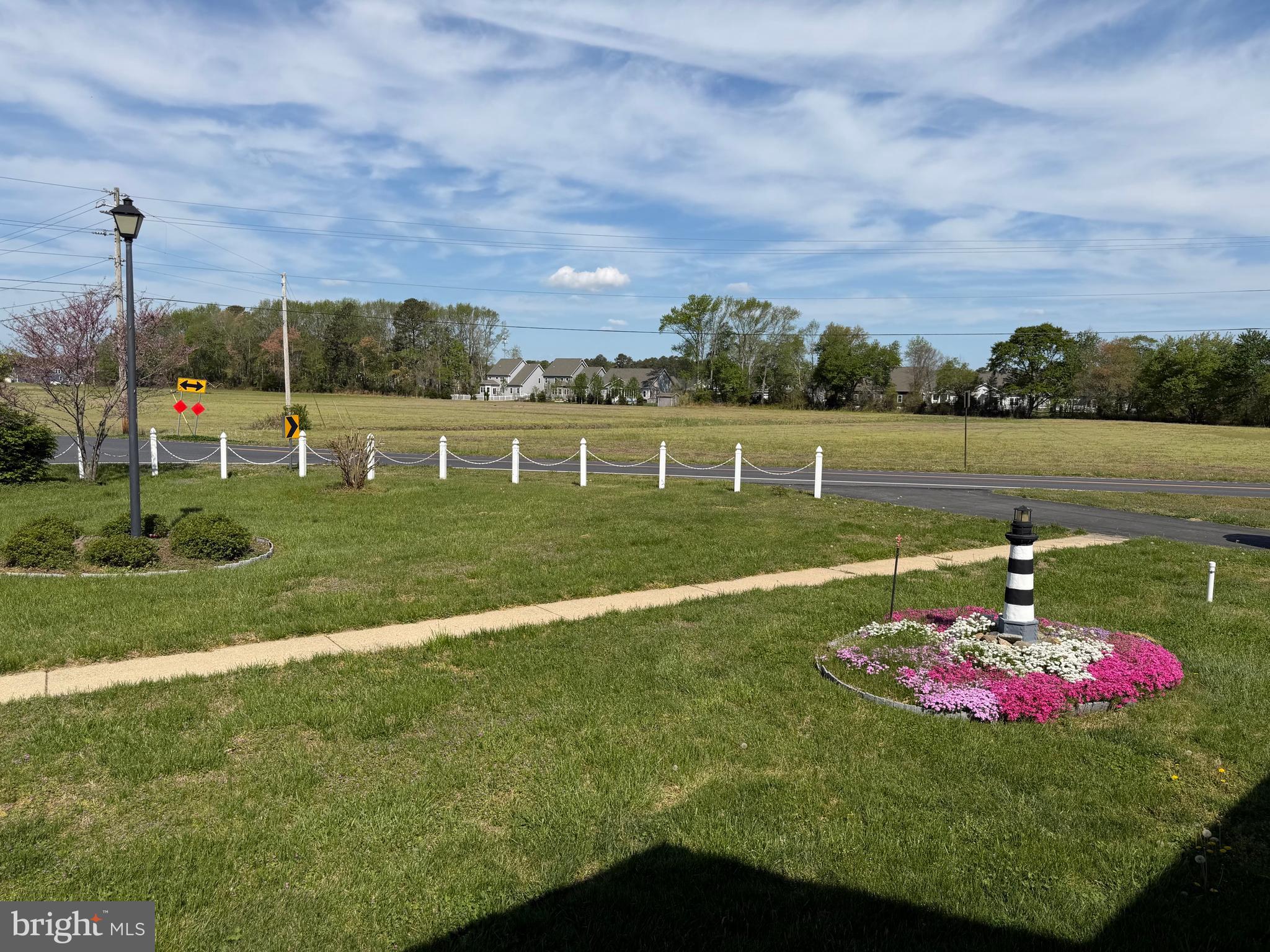 36032 Double Bridges Road Frankford, DE 19945 - Photo 6 of 51 a view of a lake with a big yard