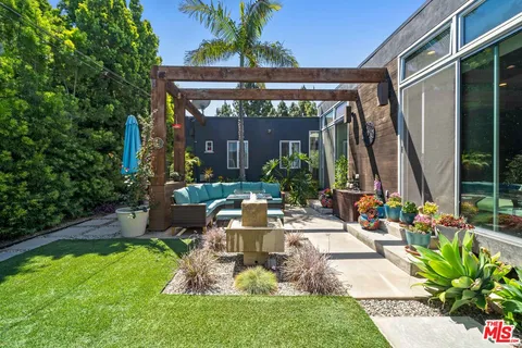 a house view with a garden space