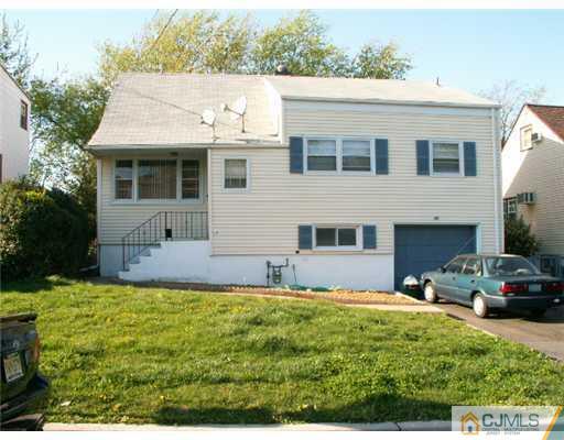 47 Inverness Terrace Fords, NJ 08863 - Photo 1 of 10 a view of house with garden and car parked