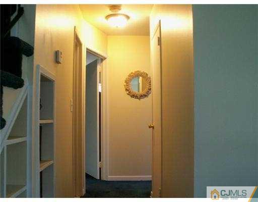 47 Inverness Terrace Fords, NJ 08863 - Photo 7 of 10 a bathroom with a shower and a mirror