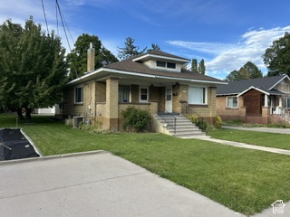 481 East Center Street Logan, UT 84321 - Photo 3 of 23 Brick and stucco exterior with a prominent front porch