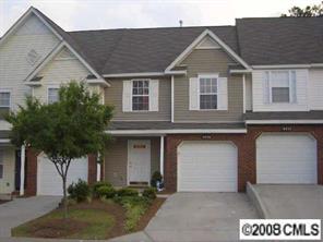 16836 Timber Crossing Road Charlotte, NC 28213 - Photo 1 of 6 a front view of a house with a yard and garage