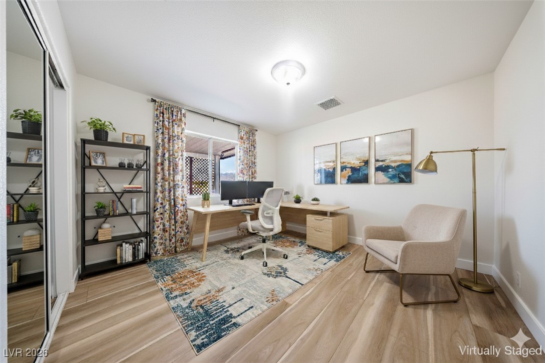 2420 Tough Boy Road Pahrump, NV 89060 - Photo 25 of 54 Office with light wood-type flooring and baseboards