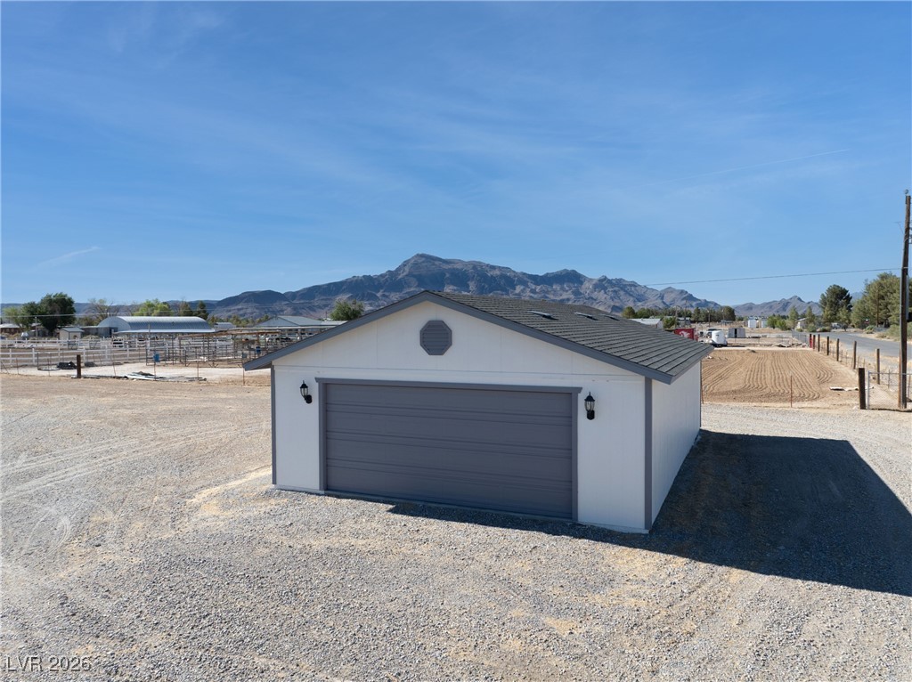 2420 Tough Boy Road Pahrump, NV 89060 - Photo 40 of 54 Detached garage featuring a mountain view