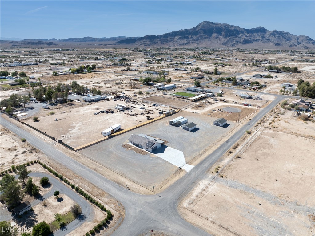 2420 Tough Boy Road Pahrump, NV 89060 - Photo 47 of 54 View of rural area featuring a mountain backdrop and a desert landscape