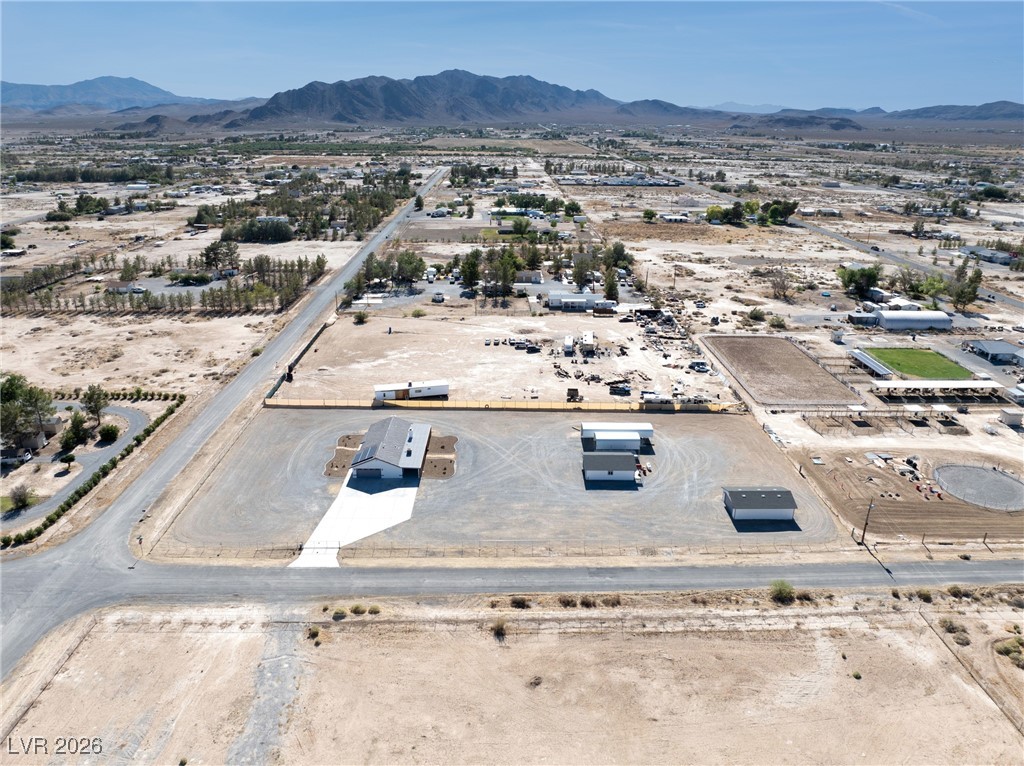 2420 Tough Boy Road Pahrump, NV 89060 - Photo 48 of 54 Aerial view of mountains and a desert landscape