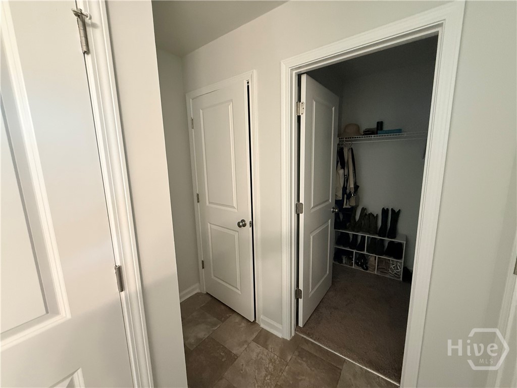 1244 Wilkins Road Midway, GA 31320 - Photo 41 of 58 Master Batrhroom leading to master closet