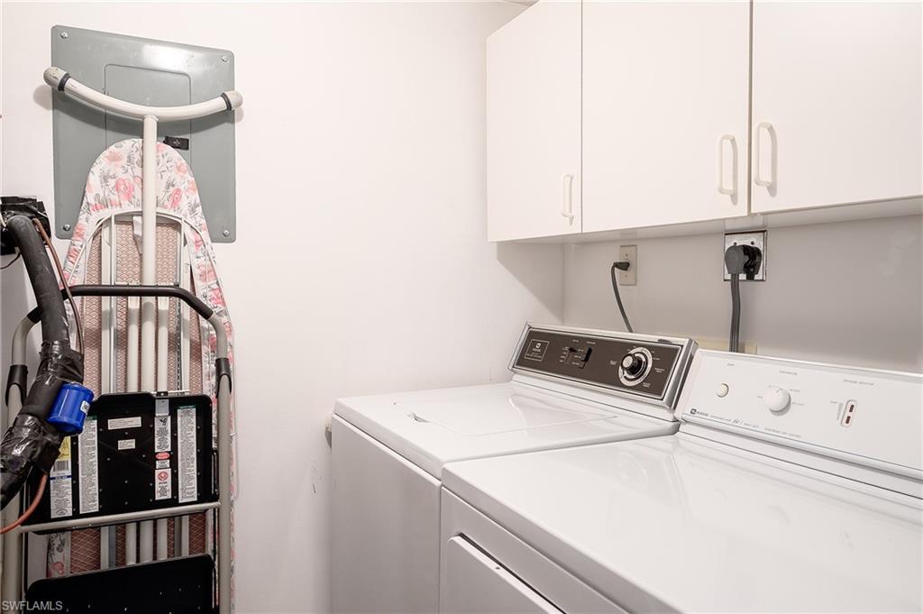 1100 9th Street South, Unit E101 Naples, FL 34102 - Photo 17 of 35 a utility room with dryer and washer
