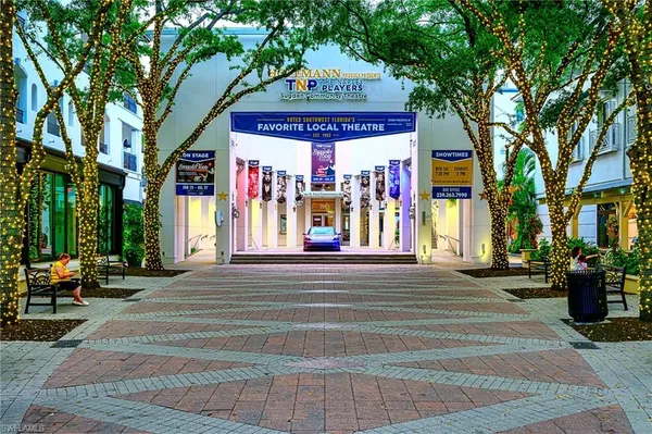 a view of water fountain in front of building