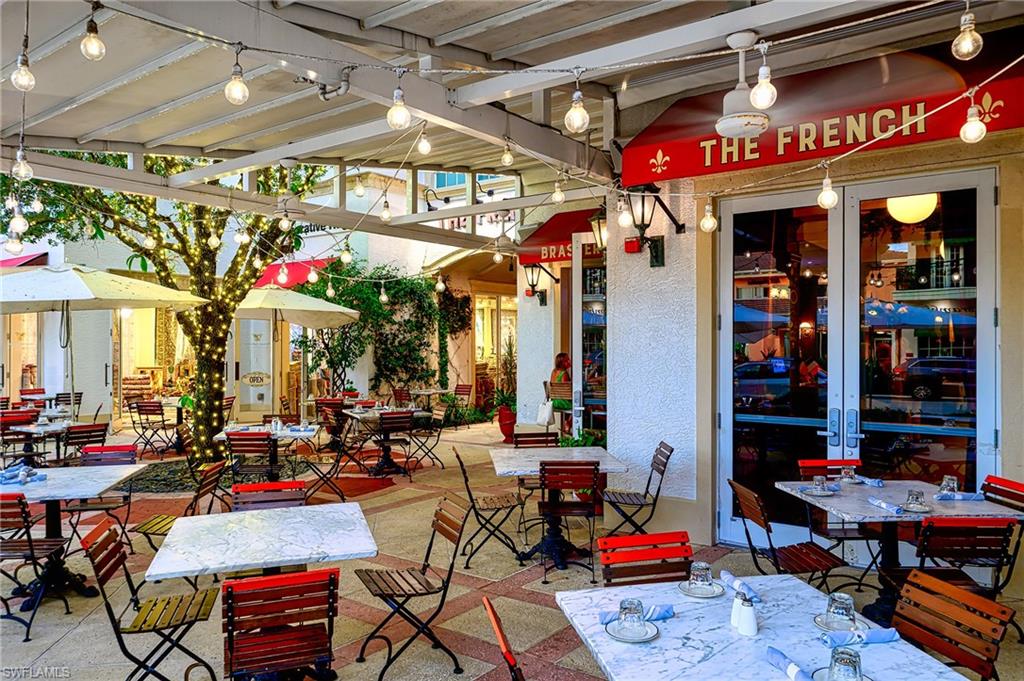 1100 9th Street South, Unit E101 Naples, FL 34102 - Photo 31 of 35 a store room with retail shops