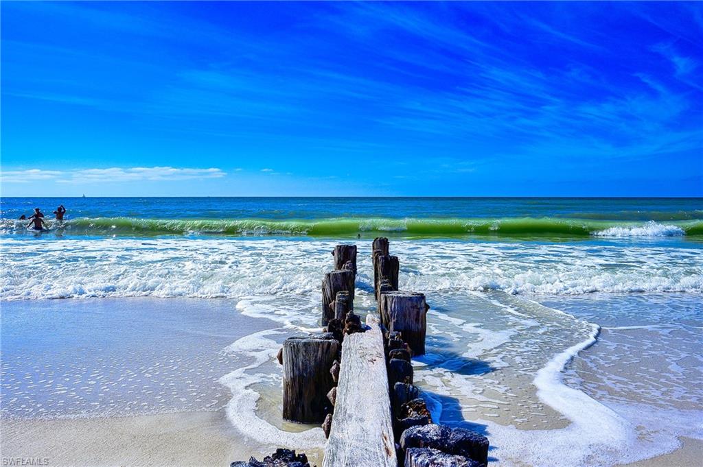 1100 9th Street South, Unit E101 Naples, FL 34102 - Photo 33 of 35 a view of a room with wooden floor
