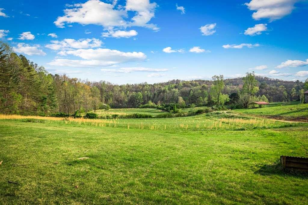 384 Maxwell Road Blue Ridge, GA 30513 - Photo 62 of 68 a view of a golf course with green space
