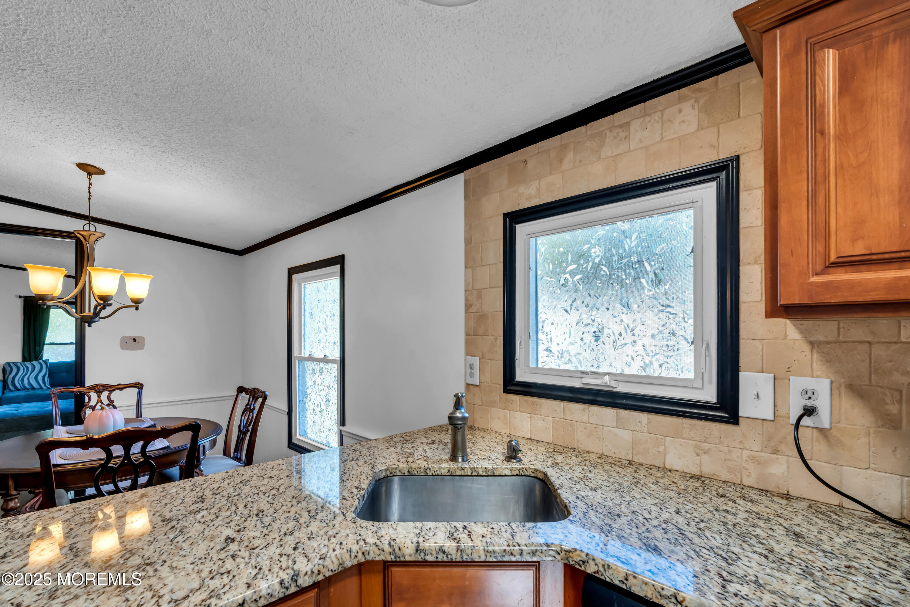 1820 Highway 35, Unit HOME SITE #26 Wall, NJ 07719 - Photo 17 of 35 a kitchen with granite countertop a sink and a granite top
