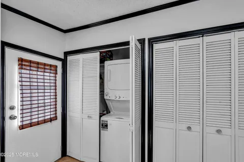 a bathroom with a shower and a sink