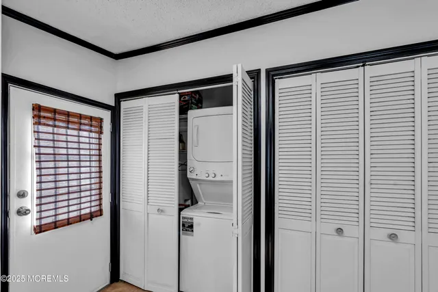 a bathroom with a shower and a sink