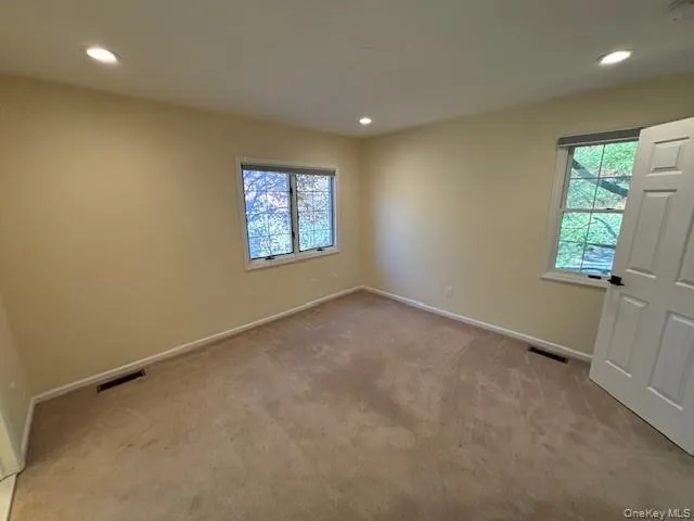 an empty room with windows