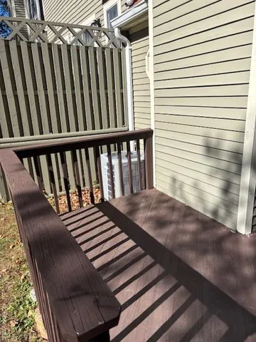 a view of a balcony with a large window